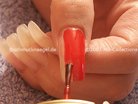 Nail polish in the colour red
