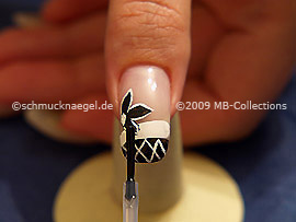The clear nail lacquer protects the nail art