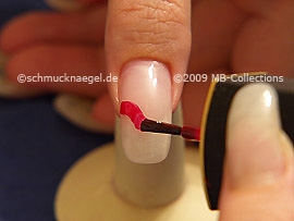 Nail lacquer in the colour red