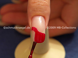 Nail lacquer in the colour red