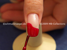 Nail lacquer in the colour red