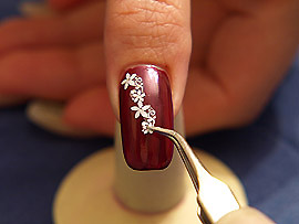 Nail art sticker and the tweezers