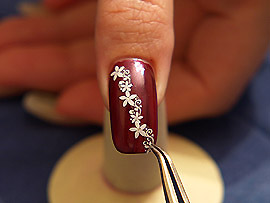 Nail art sticker and the tweezers