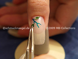 Dried leaf and the tweezers
