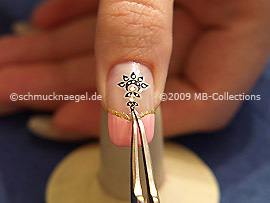 Nail sticker and the tweezers