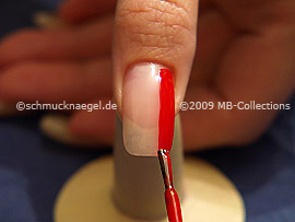 Nail lacquer in the colour red