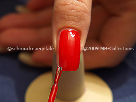 Nail lacquer in the colour red