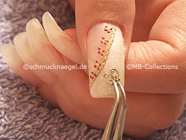 nail-tattoo sheet and the tweezers