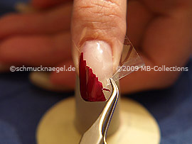 Tweezers and clear adhesive tape