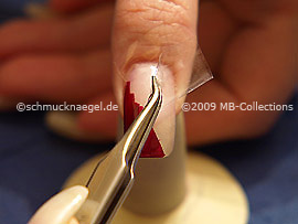 Tweezers and clear adhesive tape