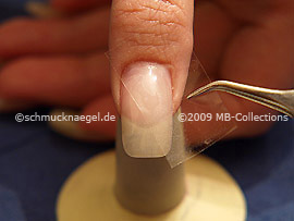 Clear adhesive tape and tweezers
