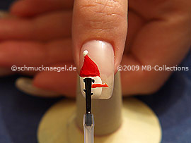 The clear nail lacquer protects the nail art