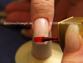 Nail lacquer in the colour red