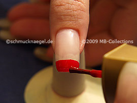 Nail lacquer in the colour red