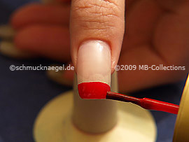 Nail lacquer in the colour red