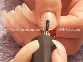 clear nail polish, spot-swirl or toohtpick and strass stones in red