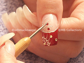 clear nail polish, spot-swirl or toohtpick and strass stones in red