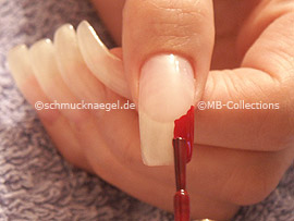 nail polish in the colour dark-red