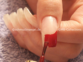 nail polish in the colour dark-red