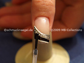 The clear nail lacquer protects the nail art