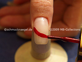 Nail lacquer in the colour dark red