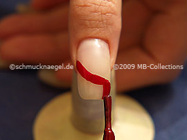 Nail lacquer in the colour dark red