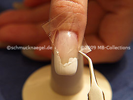 Tweezers and clear adhesive tape