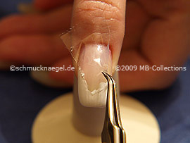 Tweezers and clear adhesive tape