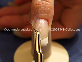 Tweezers and clear adhesive tape