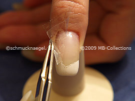 Tweezers and clear adhesive tape