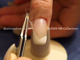 Tweezers and clear adhesive tape