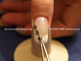 Nail-tattoo and tweezers