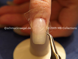 Clear adhesive tape and tweezers