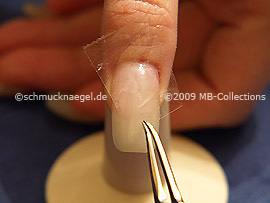 Clear adhesive tape and tweezers