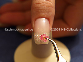 Tweezers and dried flower