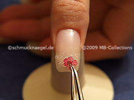 Tweezers and dried flower