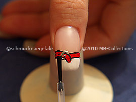 The clear nail lacquer protects the nail art