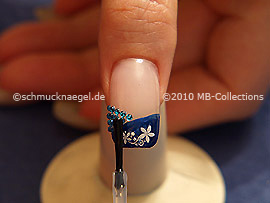 The clear nail lacquer protects the nail art