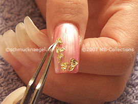 beaten gold and tweezers