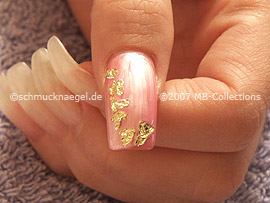 beaten gold and tweezers