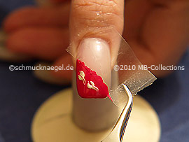 Tweezers and clear adhesive tape