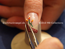 Dried flower and tweezers