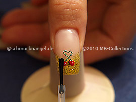 The clear nail lacquer protects the nail art