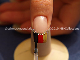 The clear nail lacquer protects the nail art