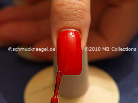 Nail lacquer in the colour red