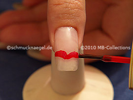 Nail lacquer in the colour red