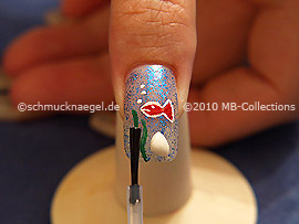 The clear nail lacquer protects the nail art