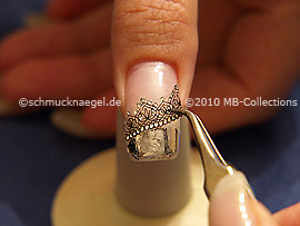 3D nail art sticker and the tweezers