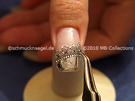 3D nail art sticker and the tweezers