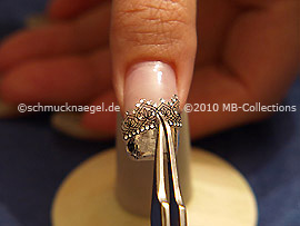 3D nail art sticker and the tweezers